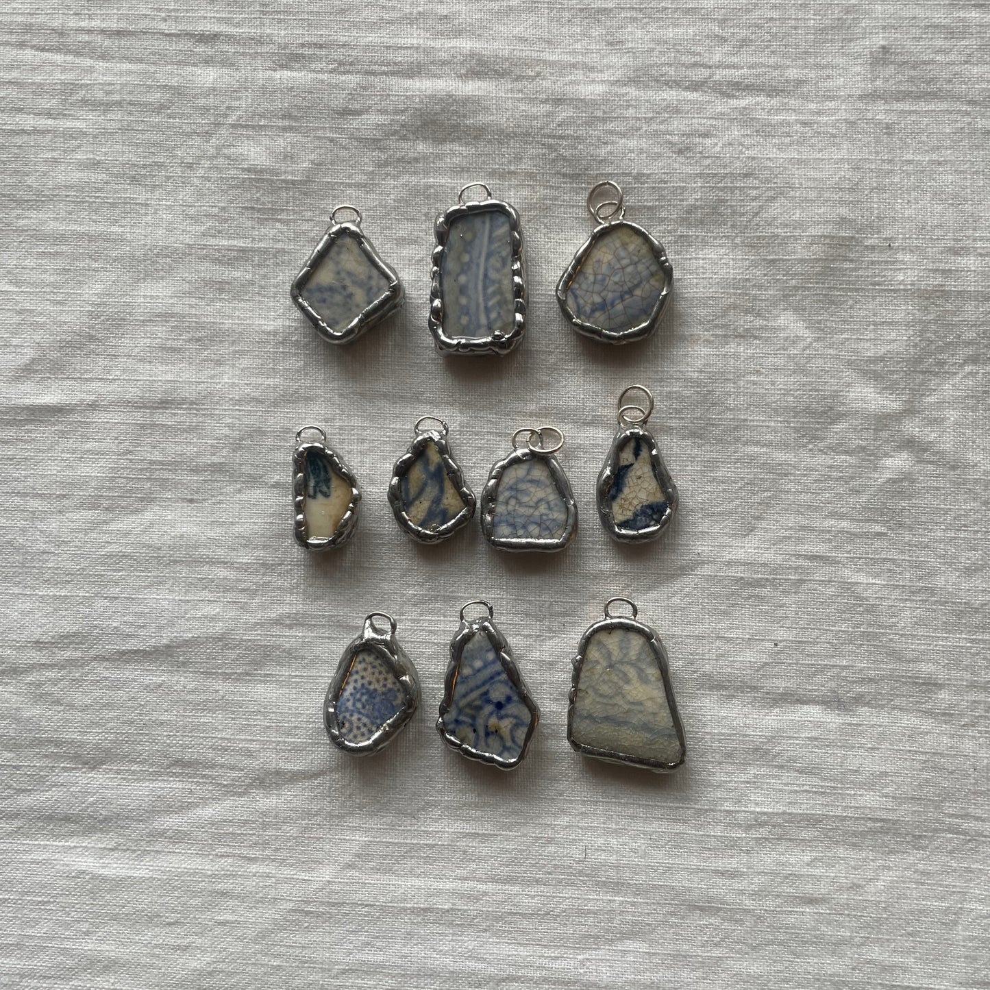 Sea pottery and silver pendant blue pattern