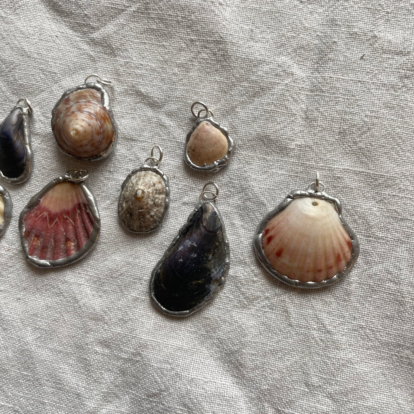 Shell and silver pendant