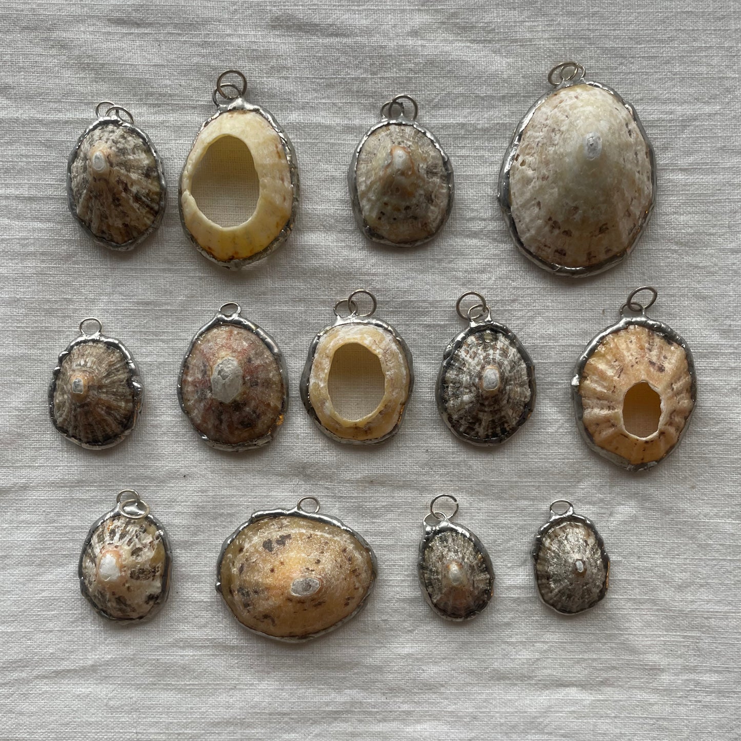 Shell and silver pendant limpet