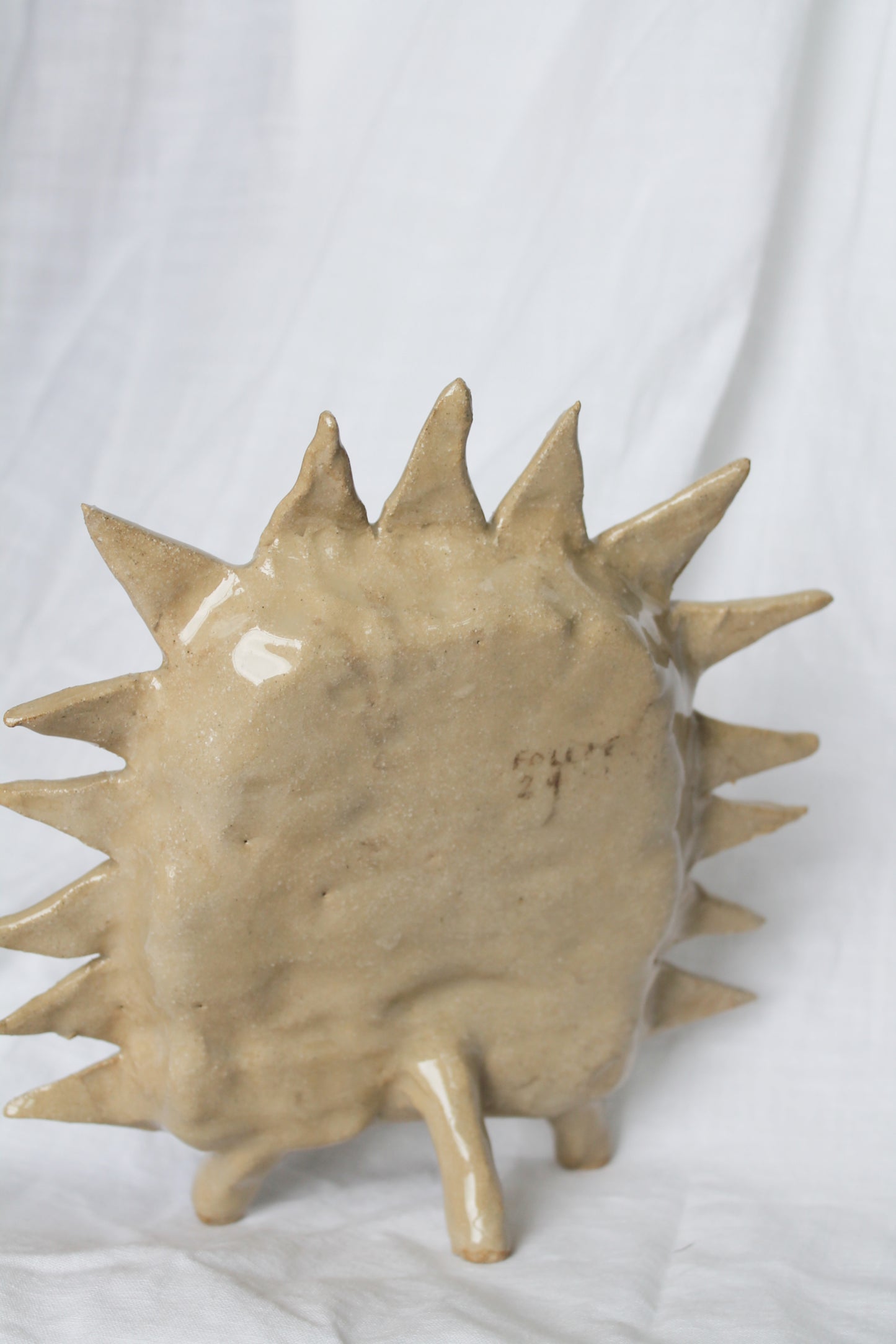 Freestanding spiky treasure shelf