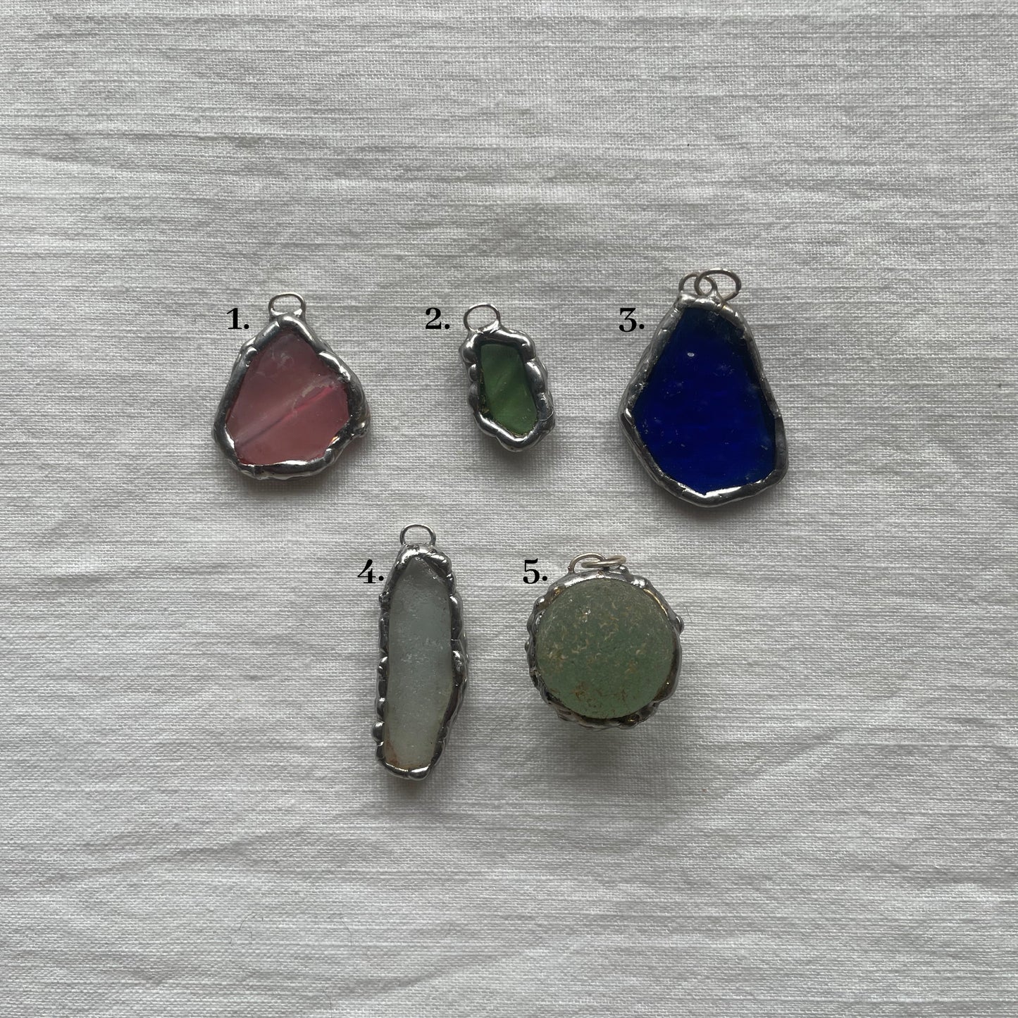 Sea glass and silver pendant