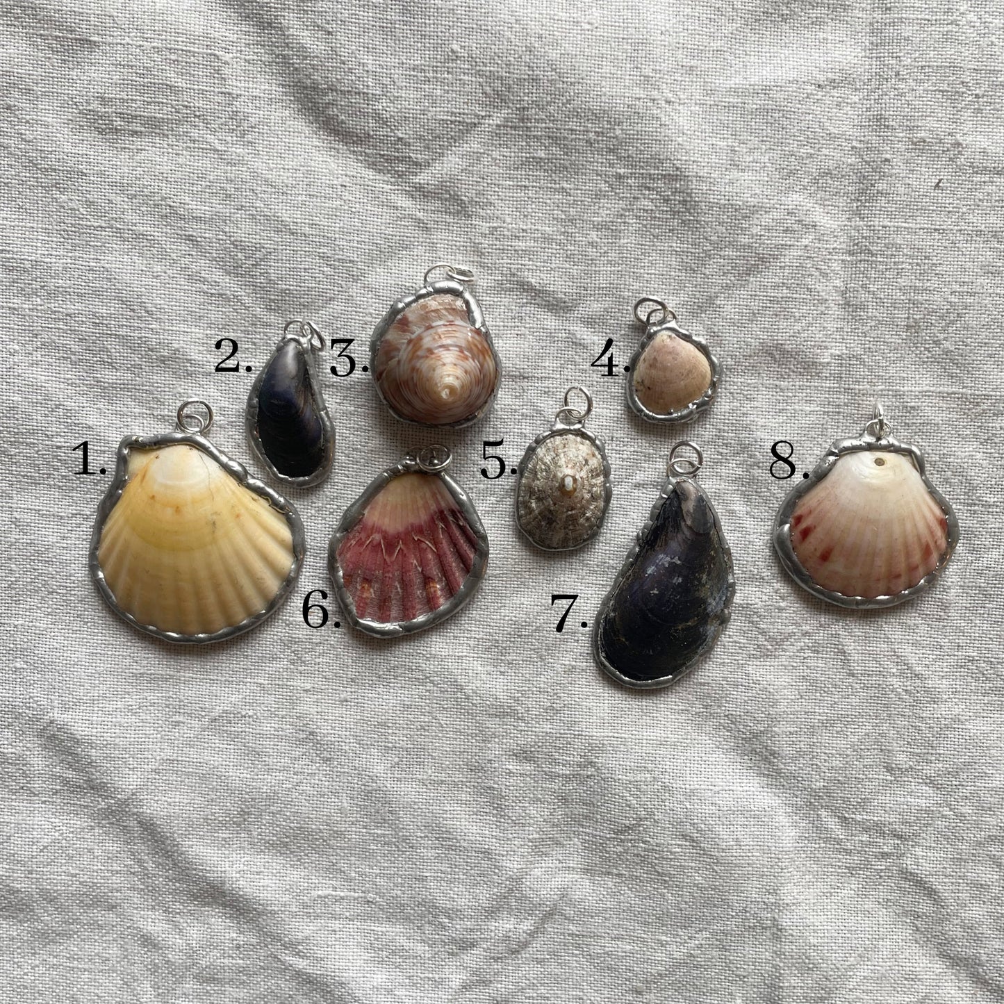 Shell and silver pendant