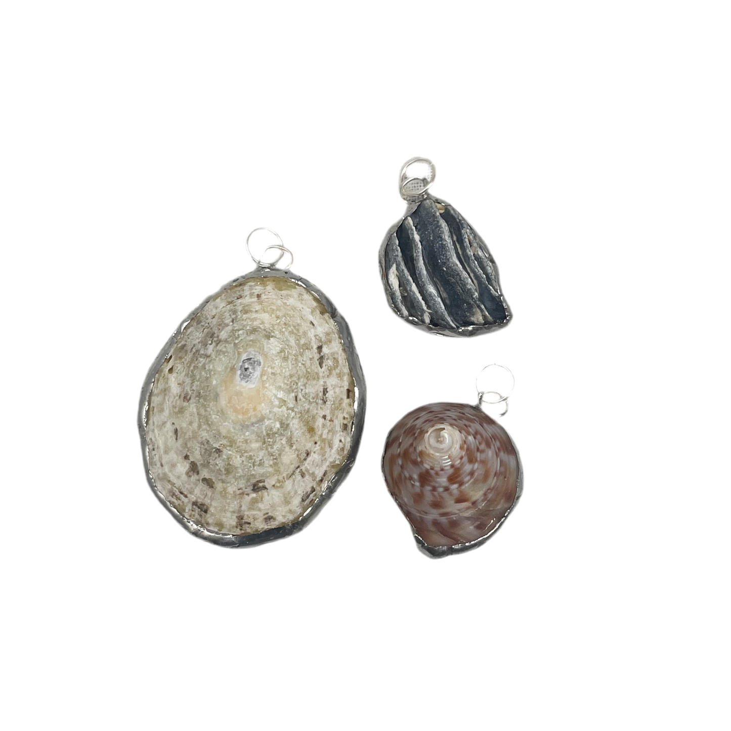 Shell and silver pendant