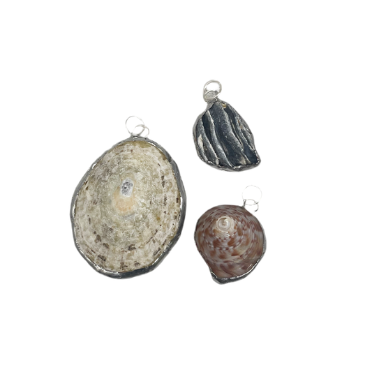 Shell and silver pendant