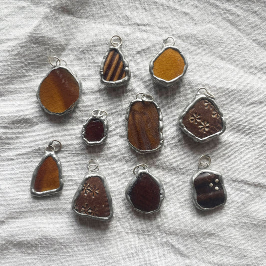 Sea pottery and silver pendant