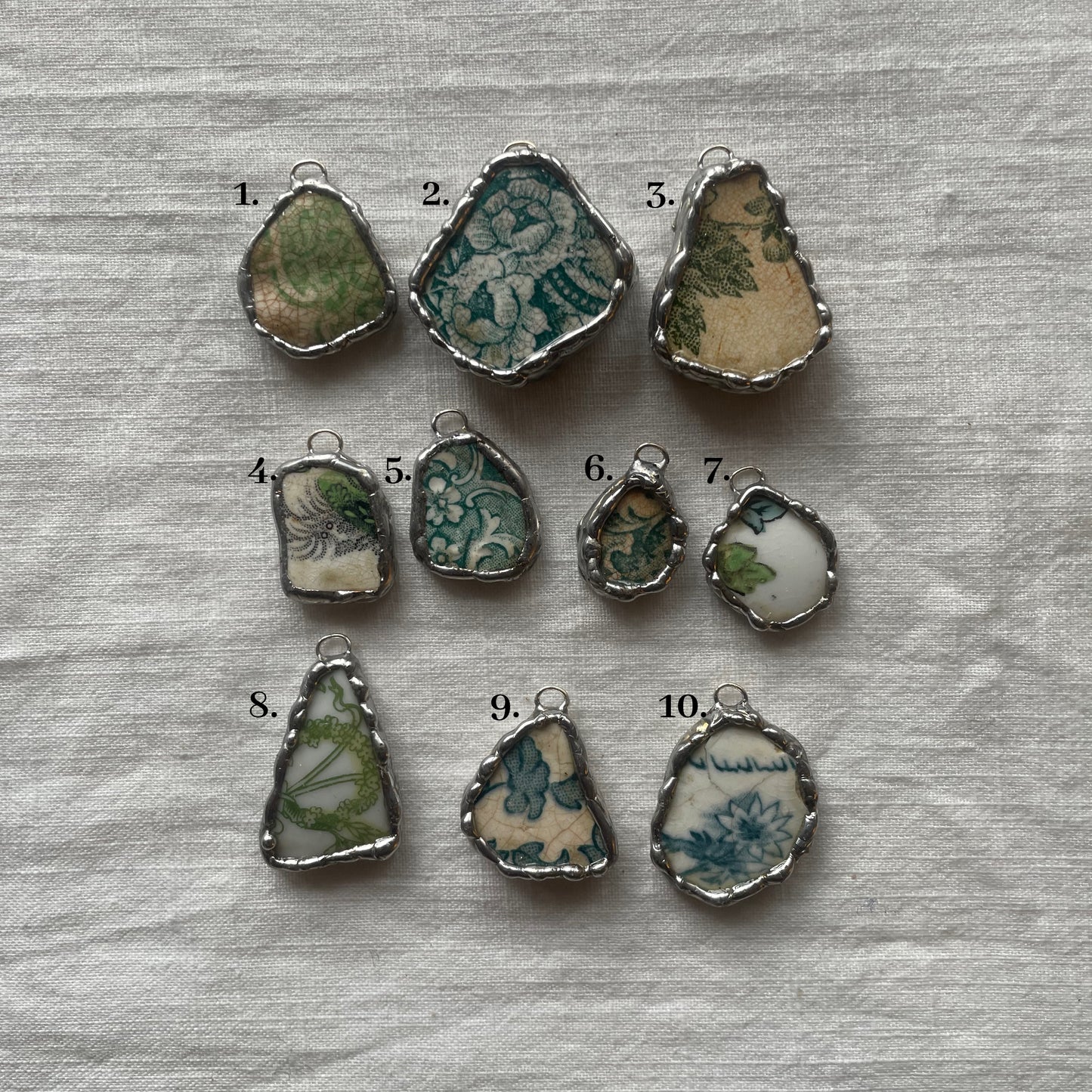 Sea pottery and silver pendant greens