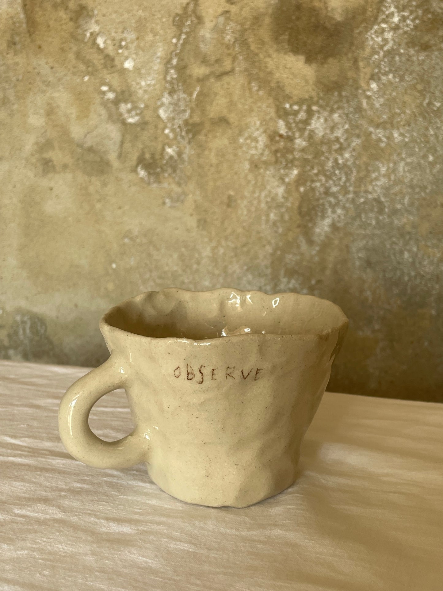Observe, breathe, focus, decide tea cup