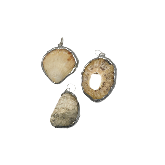 Shell and silver pendant