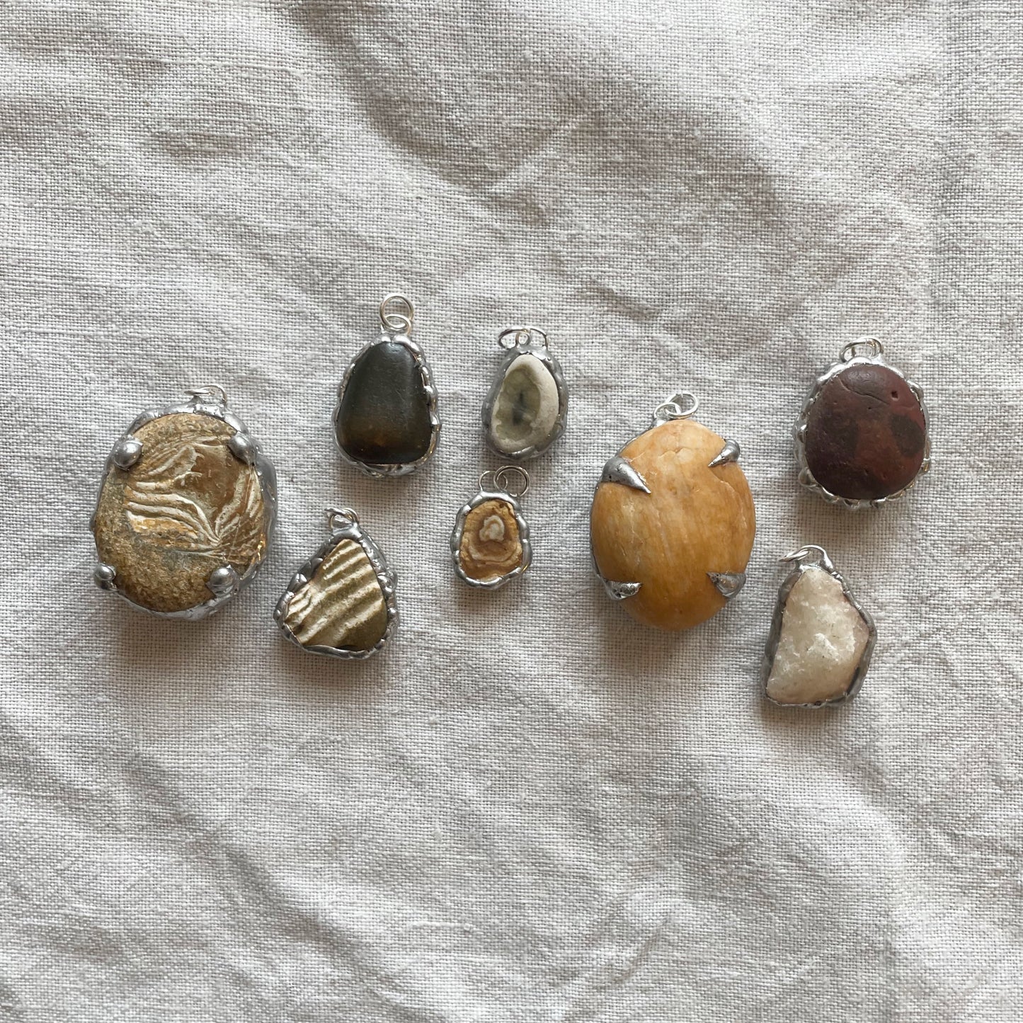 Stone and silver pendant