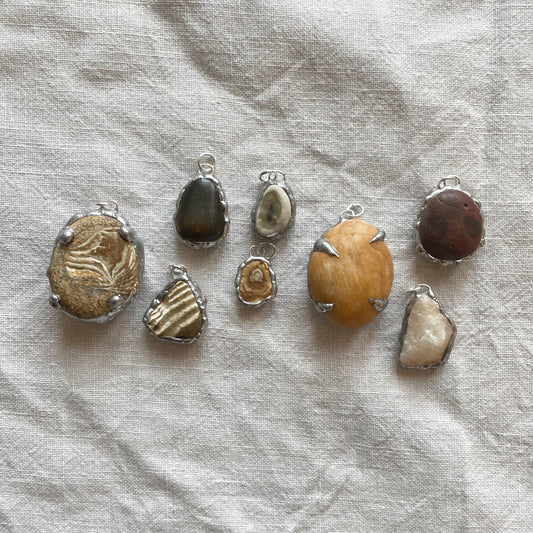 Stone and silver pendant