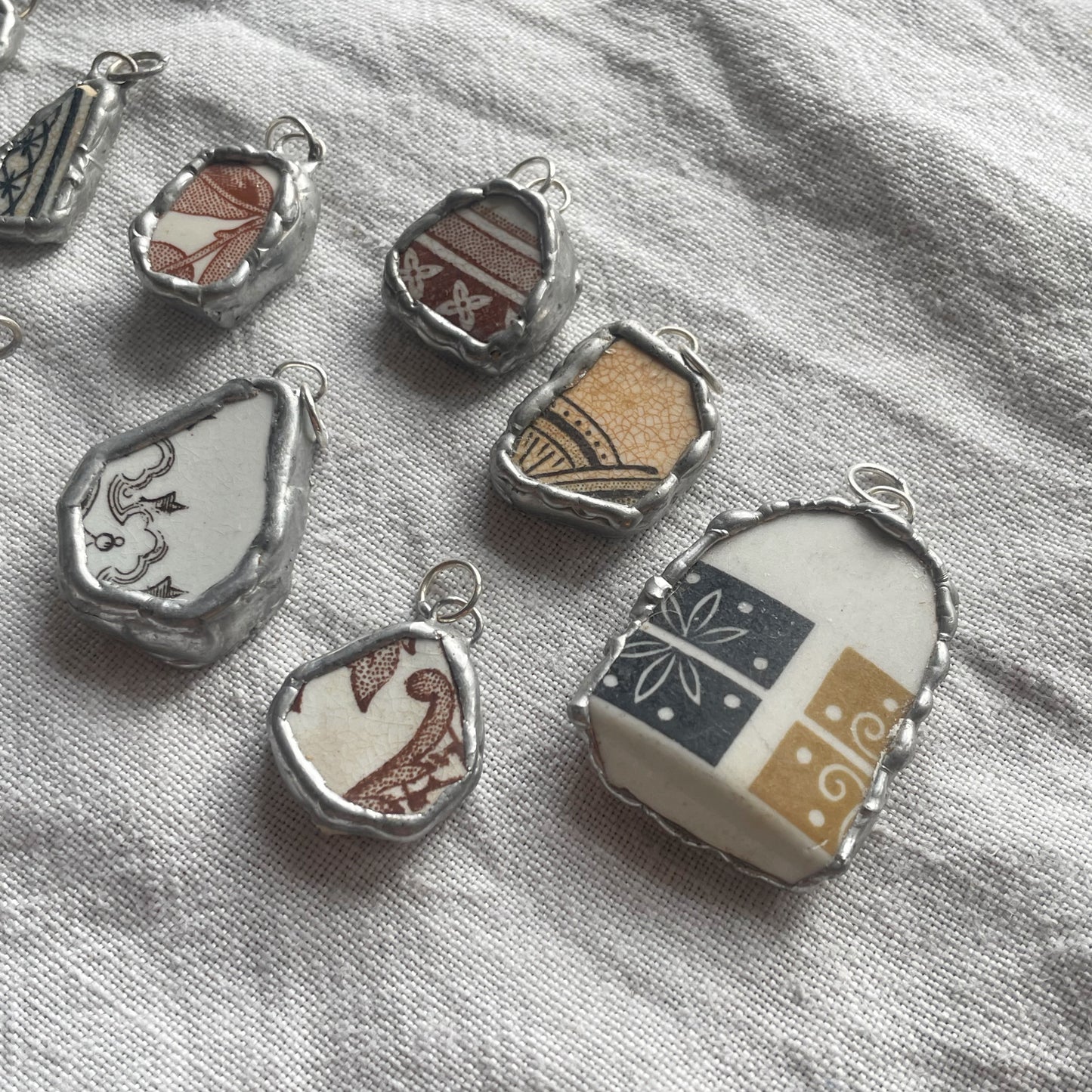 Sea pottery and silver pendant