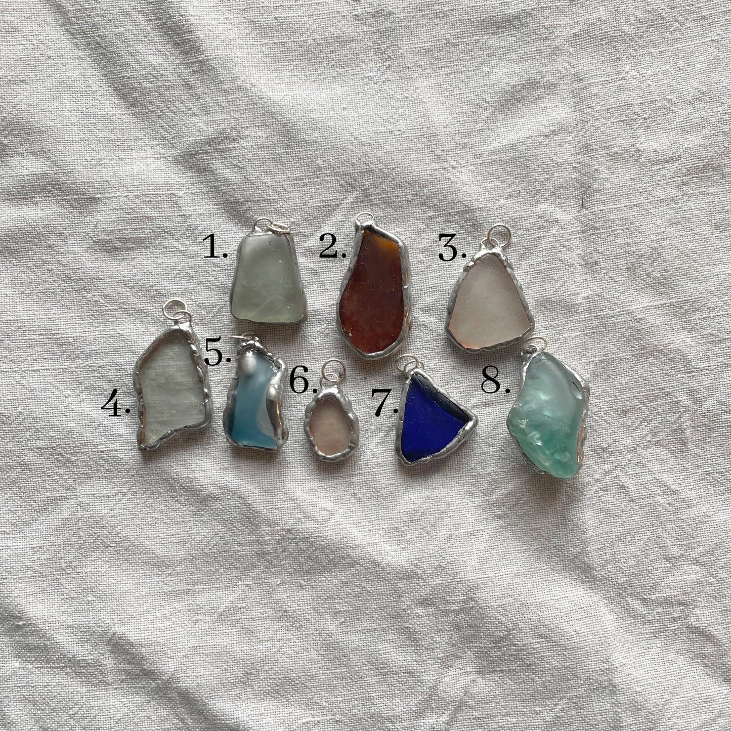 Sea glass and silver pendant