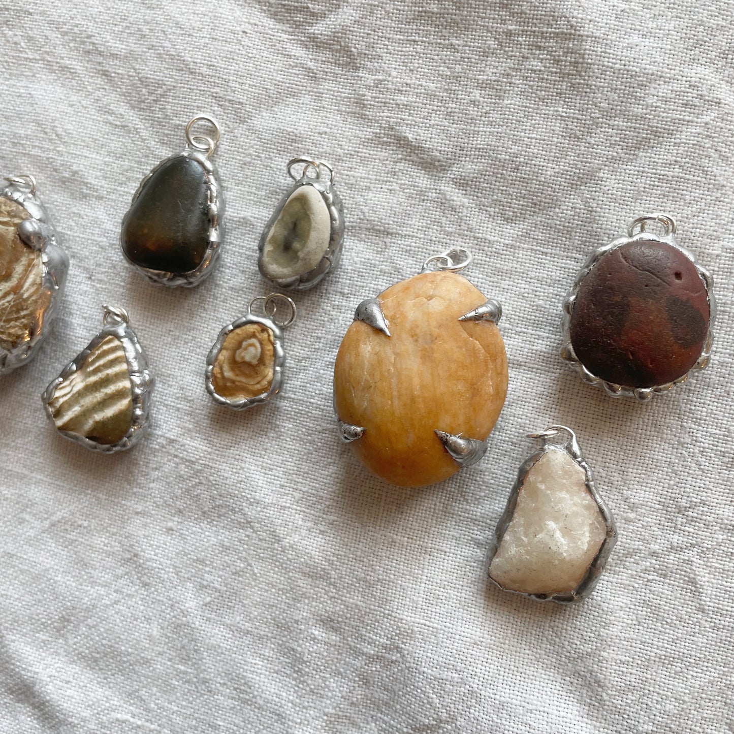 Stone and silver pendant