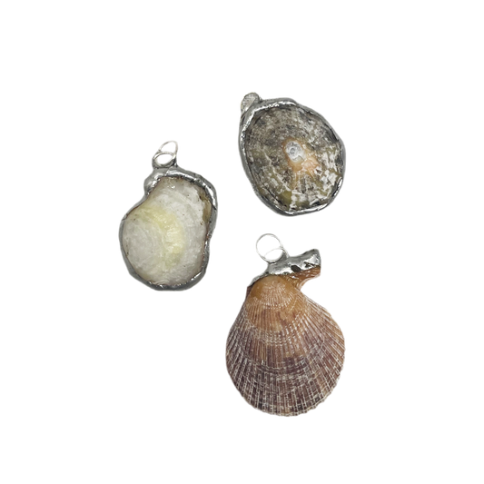 Shell and silver pendant