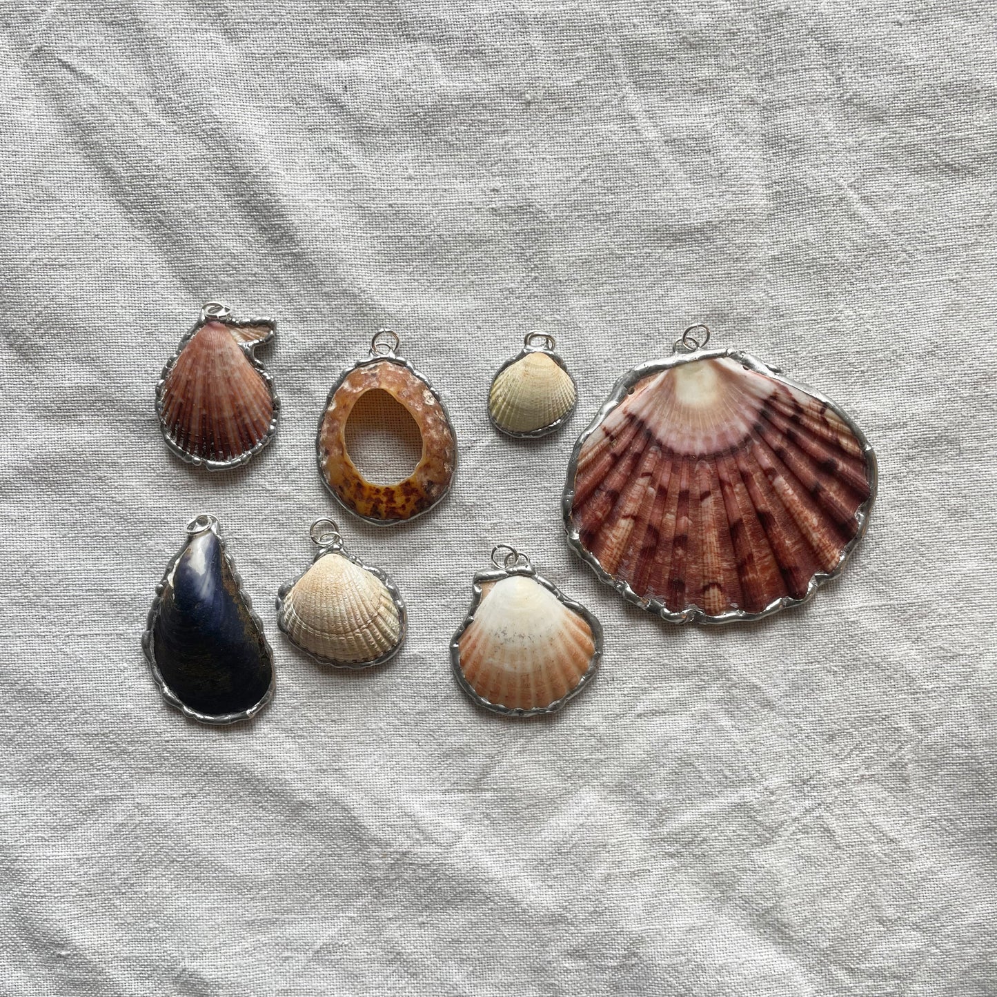 Shell and silver pendant