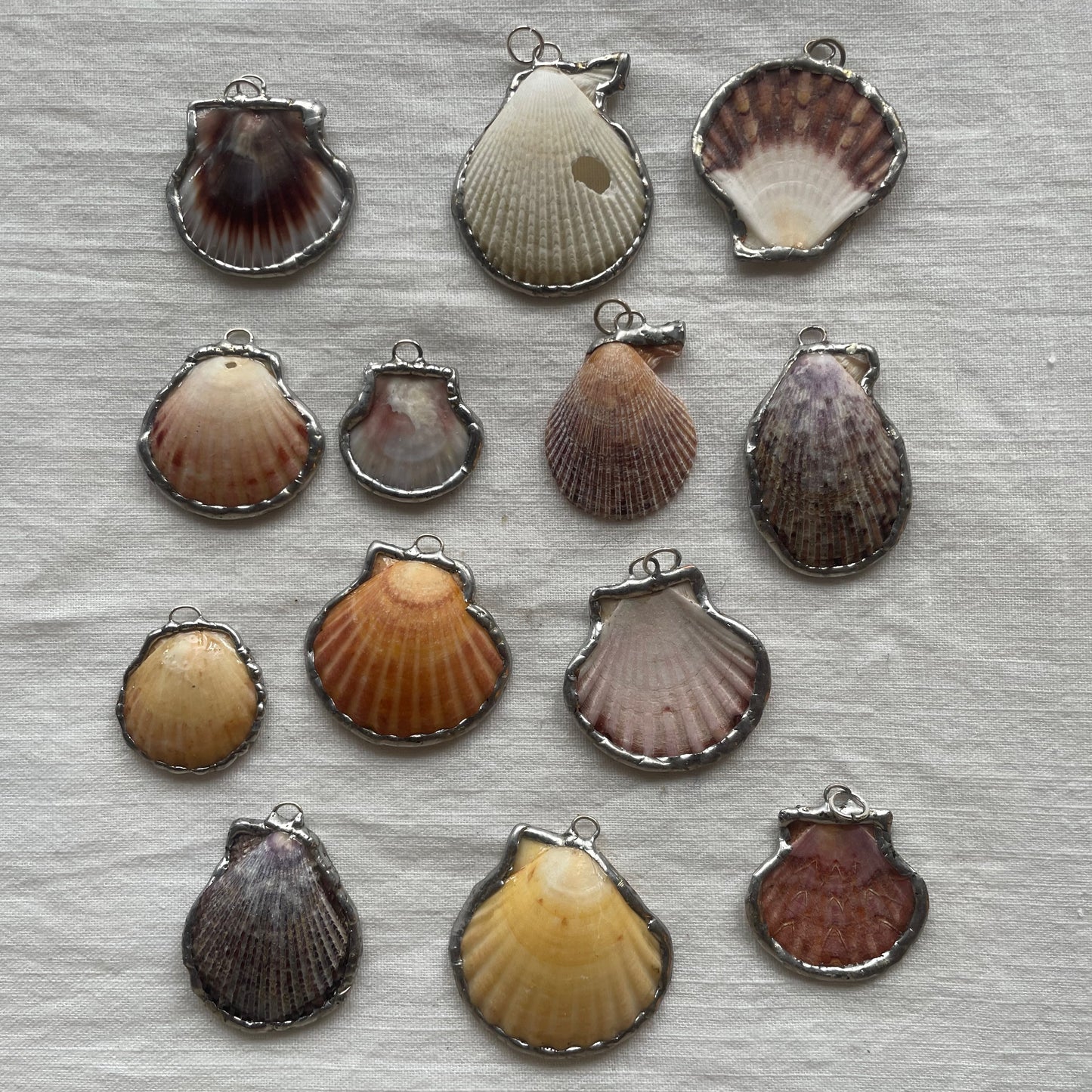 Shell and silver pendant scallop