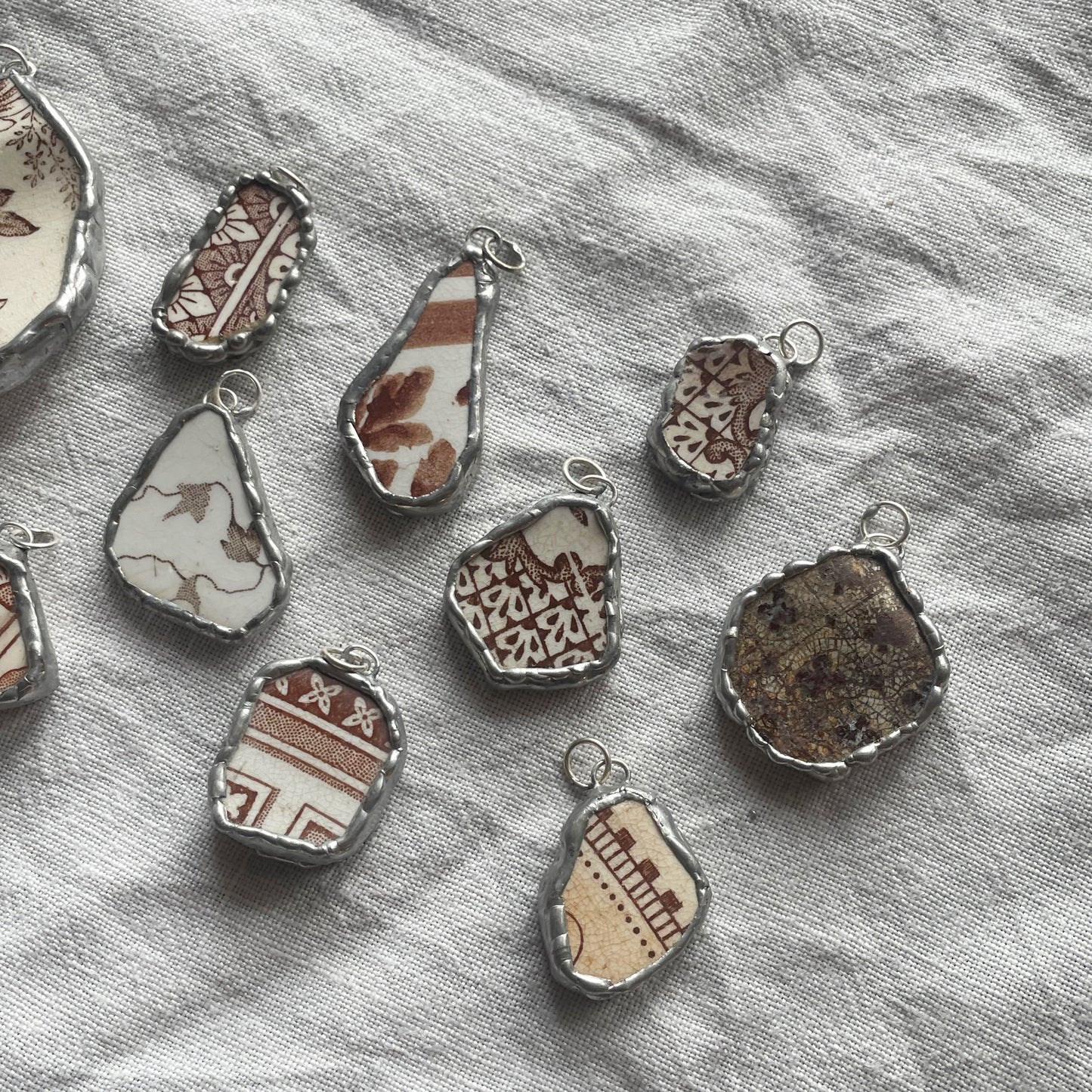 Sea pottery and silver pendant