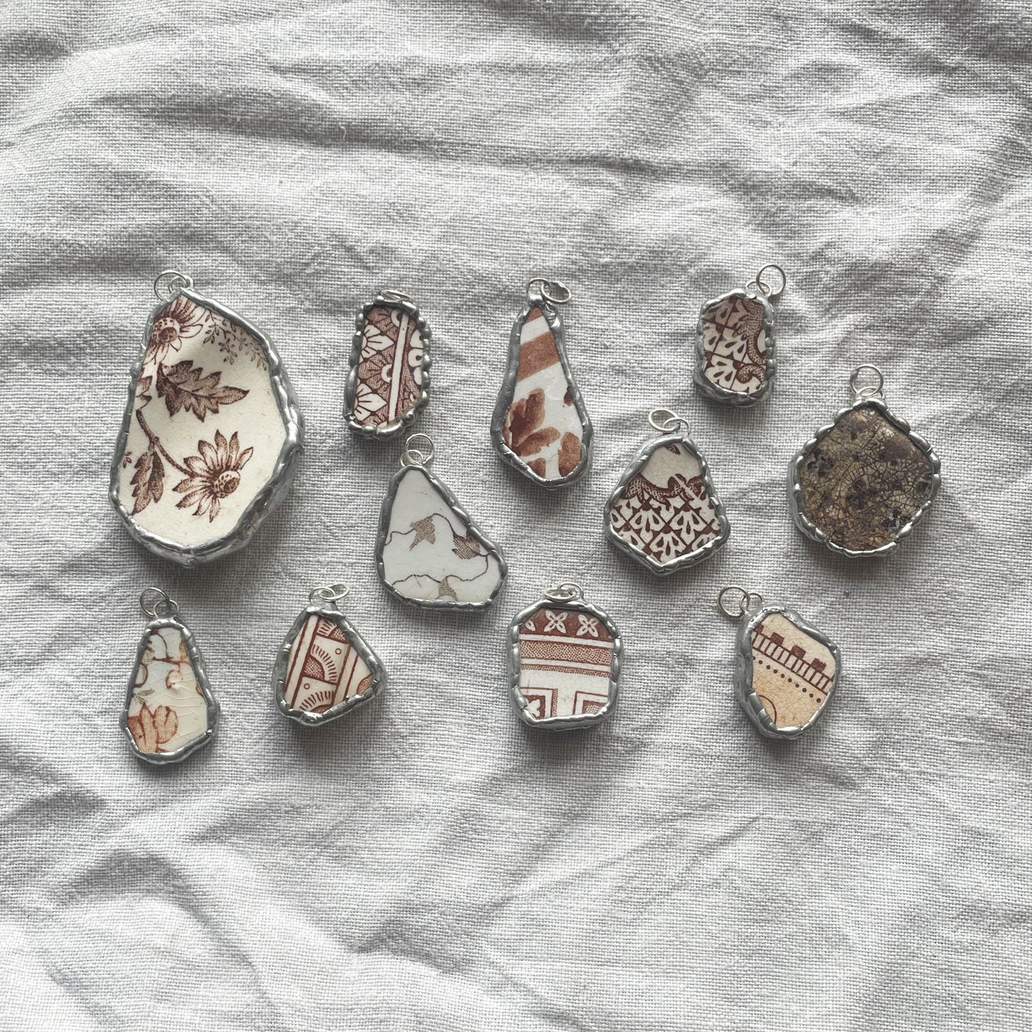 Sea pottery and silver pendant
