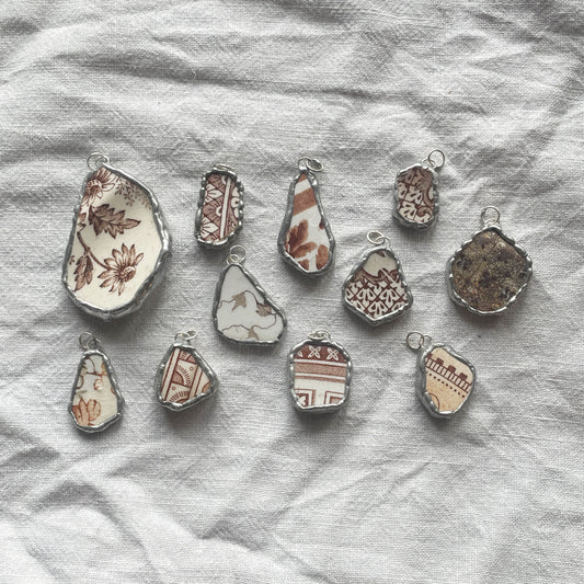 Sea pottery and silver pendant