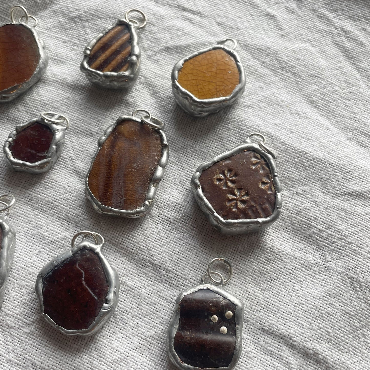 Sea pottery and silver pendant