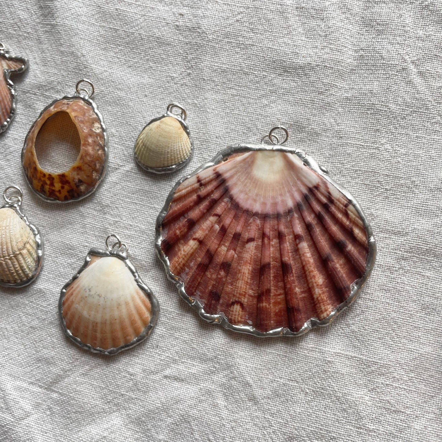 Shell and silver pendant