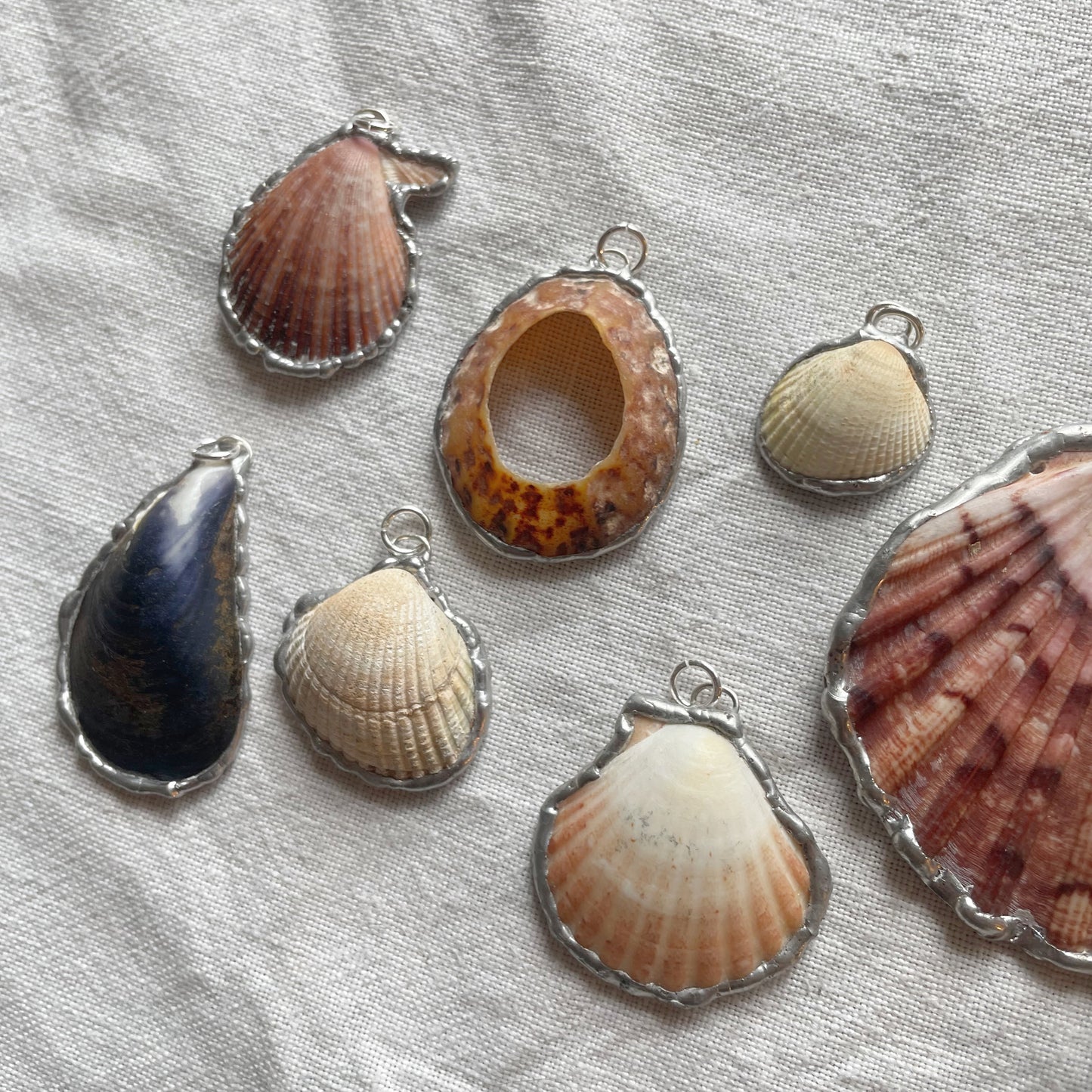 Shell and silver pendant