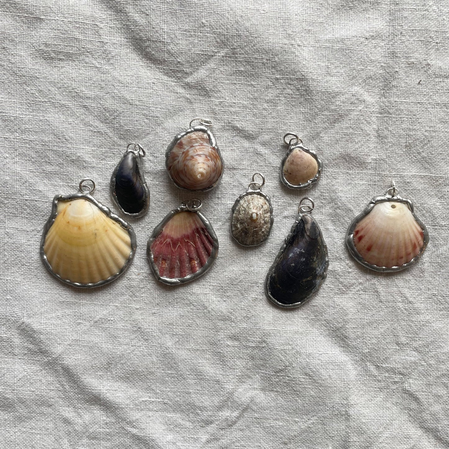 Shell and silver pendant