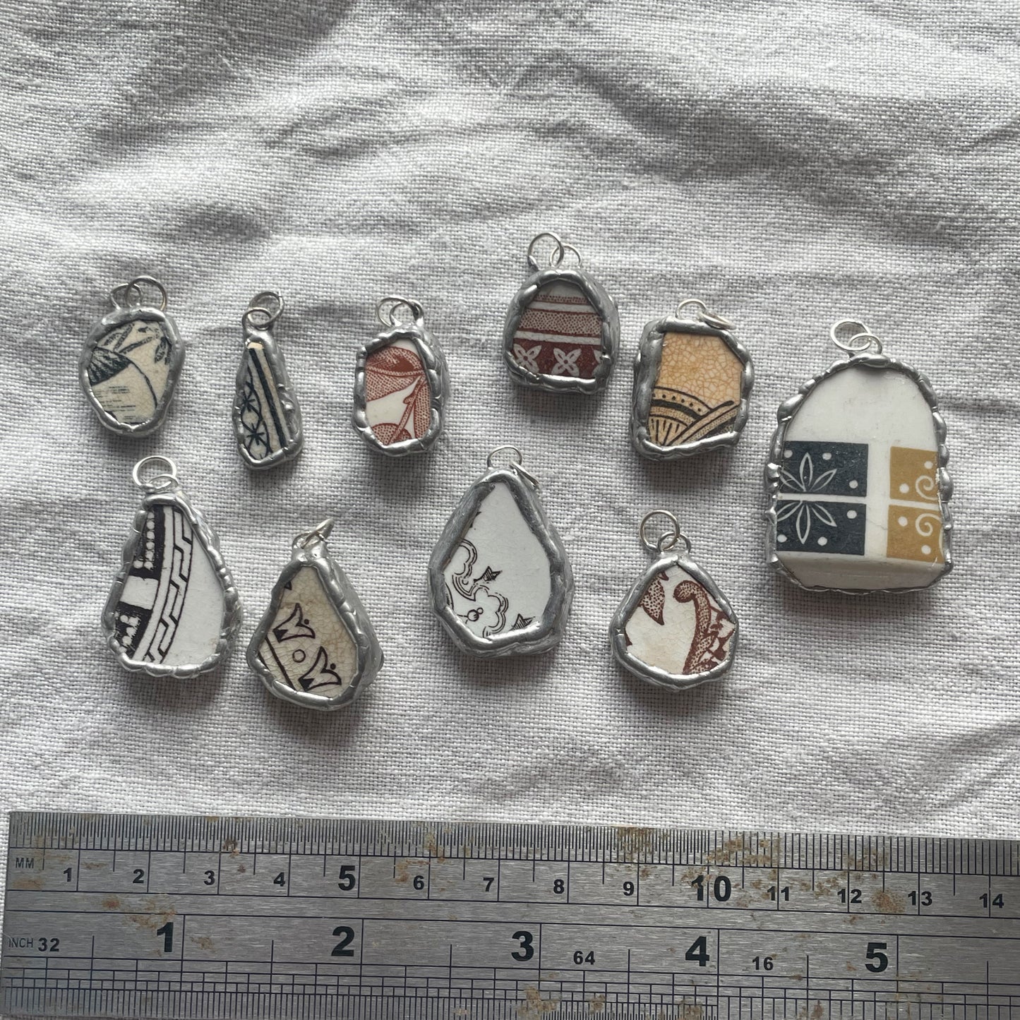 Sea pottery and silver pendant