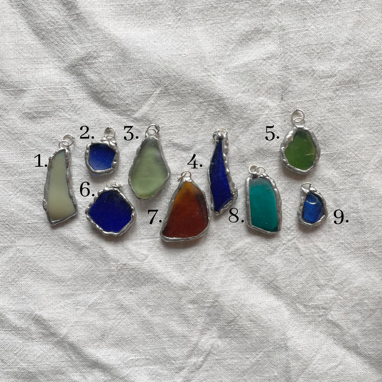 Sea glass and silver pendant