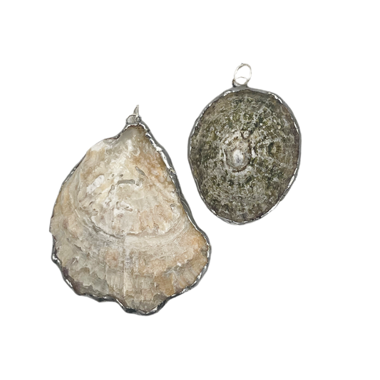 Shell and silver pendant