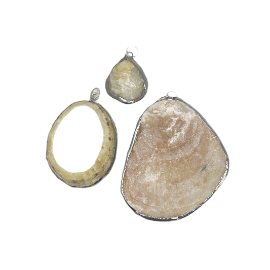 Shell and silver pendant