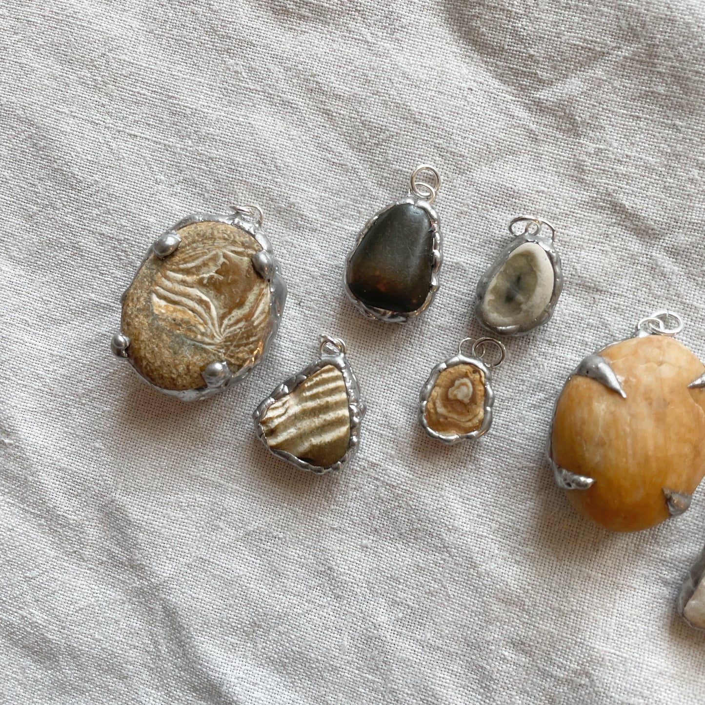 Stone and silver pendant