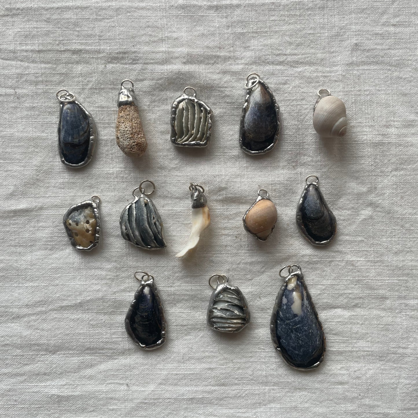 Shell and silver pendant