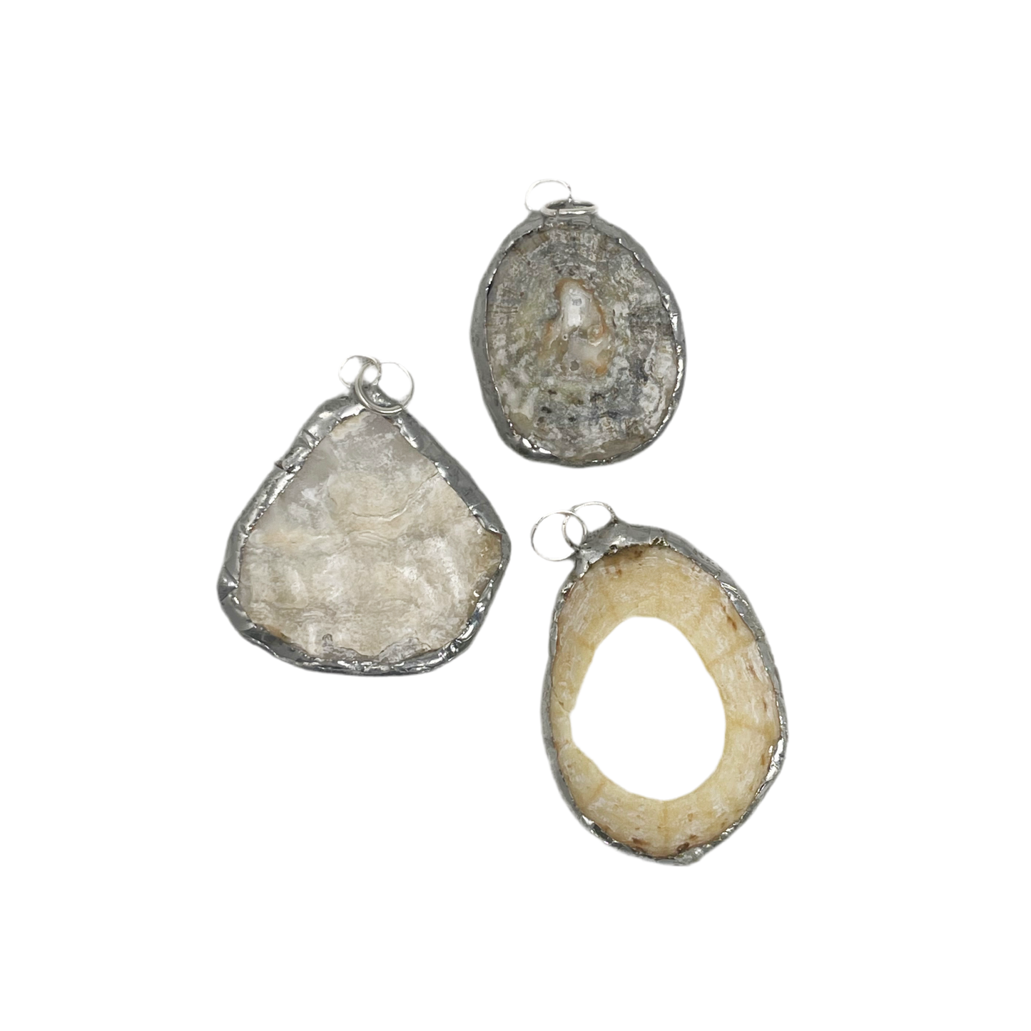 Shell and silver pendant