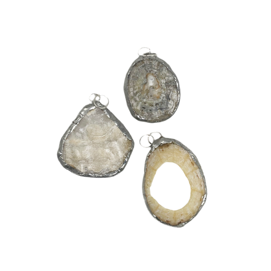 Shell and silver pendant